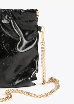 Bandolera efecto piel brillante