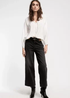 Blusa detalle eyelets