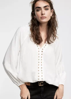 Blusa detalle eyelets