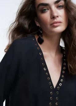 Blusa detalle eyelets