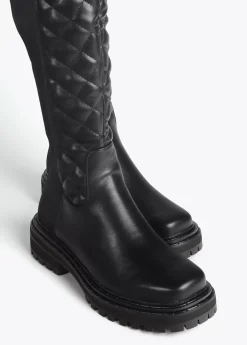 Bota de caña alta acolchada