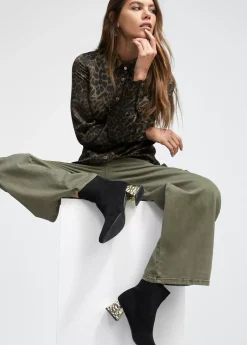 Botín con tacón dorado