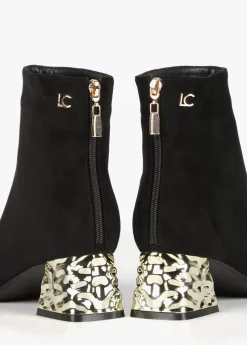 Botín con tacón dorado