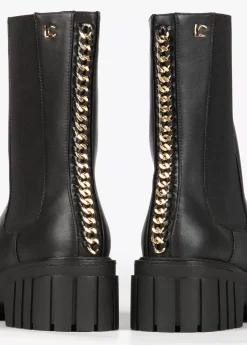 Botín negro con cadena