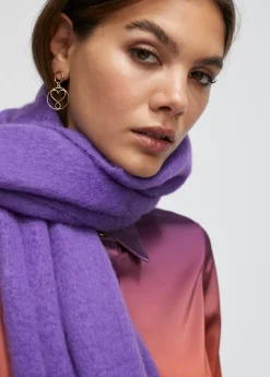 Bufanda con flecos trenzados