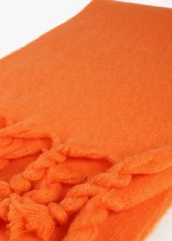 Bufanda con flecos trenzados