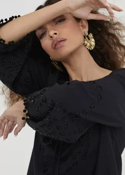 Caftan corto con bordado