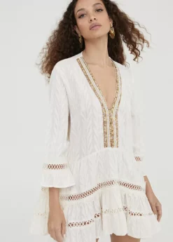 Caftan corto de volantes