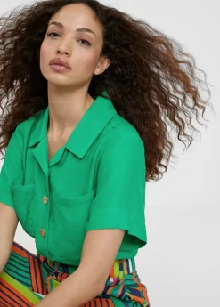 Camisa fluida con bolsillos