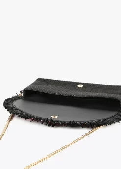 Cartera de mano con piedras de color