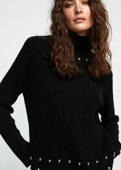 Jersey cuello alto con tachas