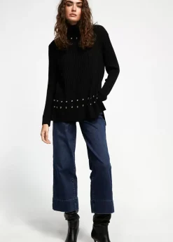 Jersey cuello alto con tachas