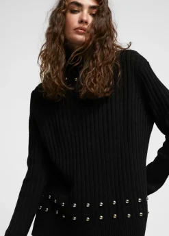 Jersey cuello alto con tachas