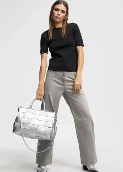 Jersey de punto tachas