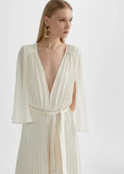 Mono plisado mangas capa