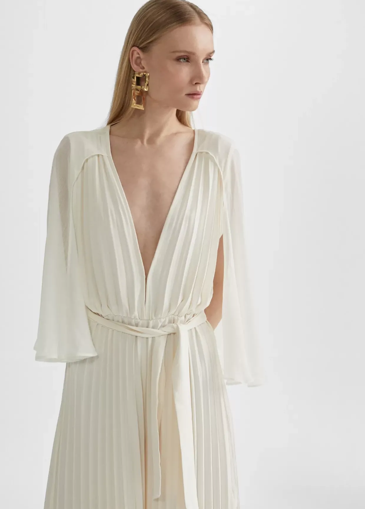 Mono plisado mangas capa