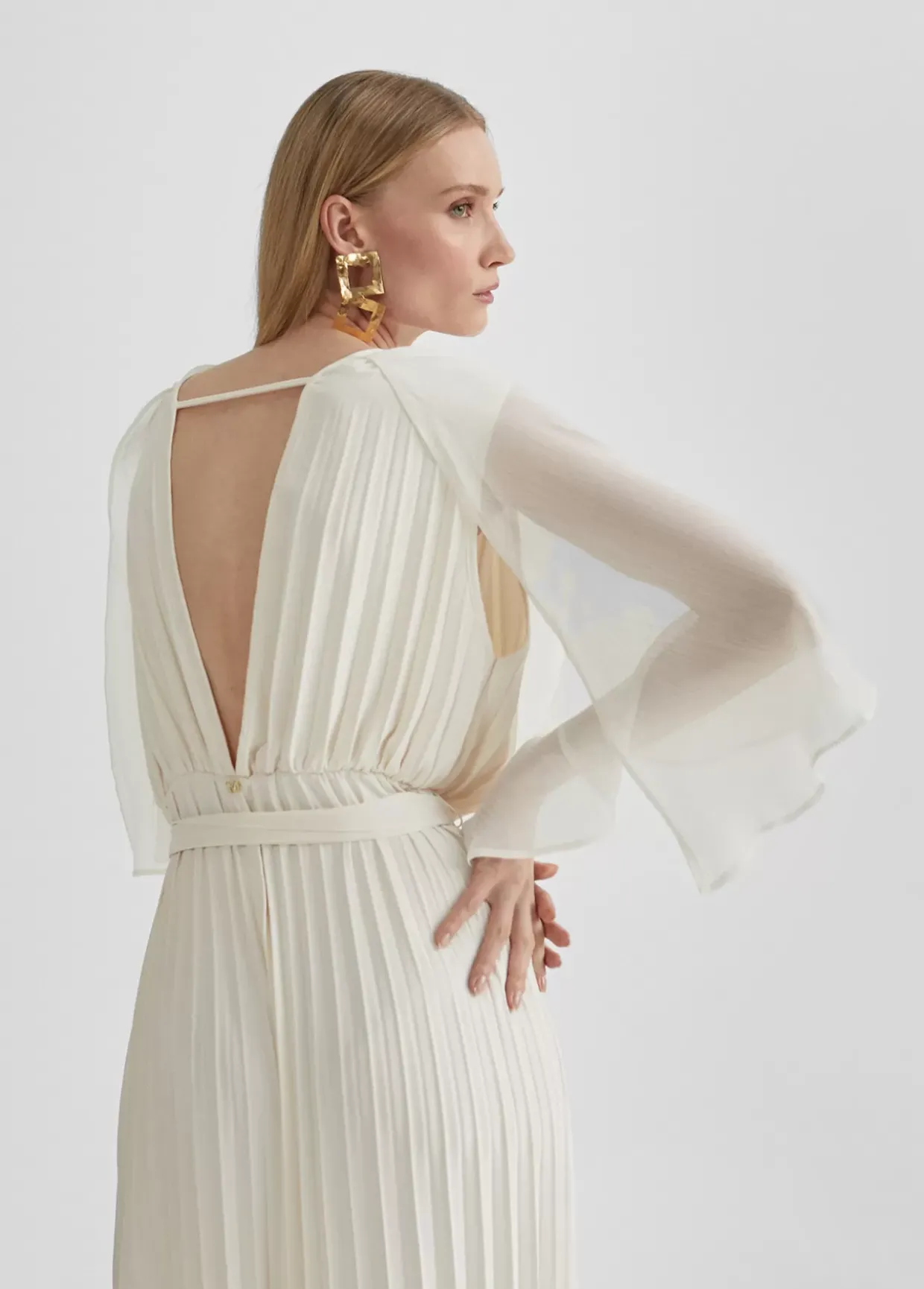 Mono plisado mangas capa