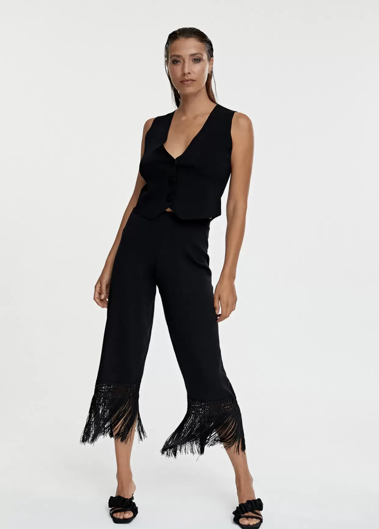 Pantalón punto flecos