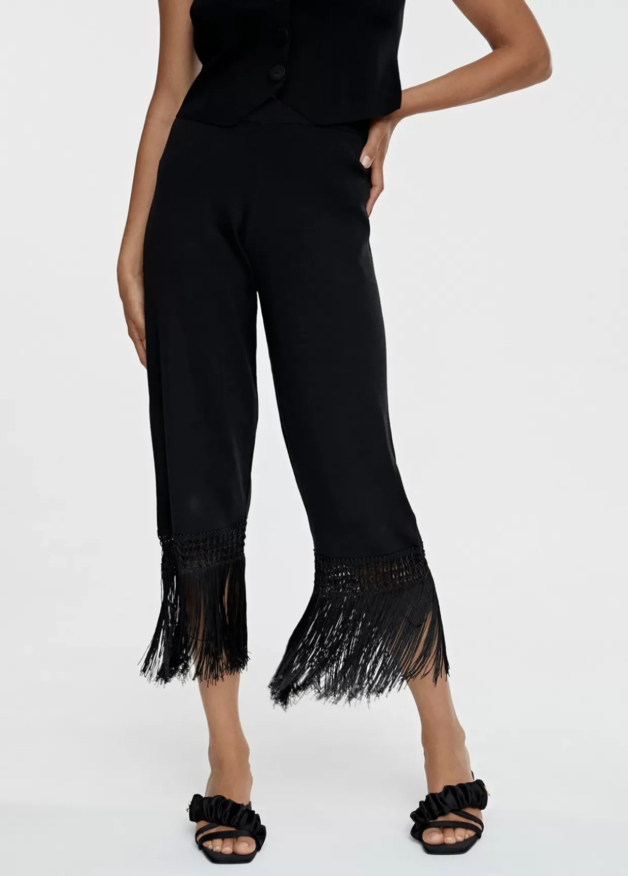 Pantalón punto flecos
