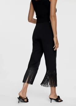 Pantalón punto flecos