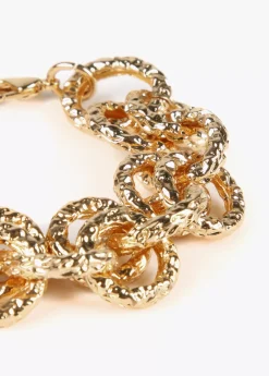 Pulsera de cadena dorada
