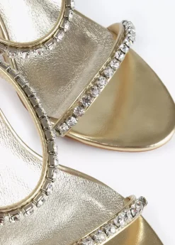 Sandalia de tacón y tiras