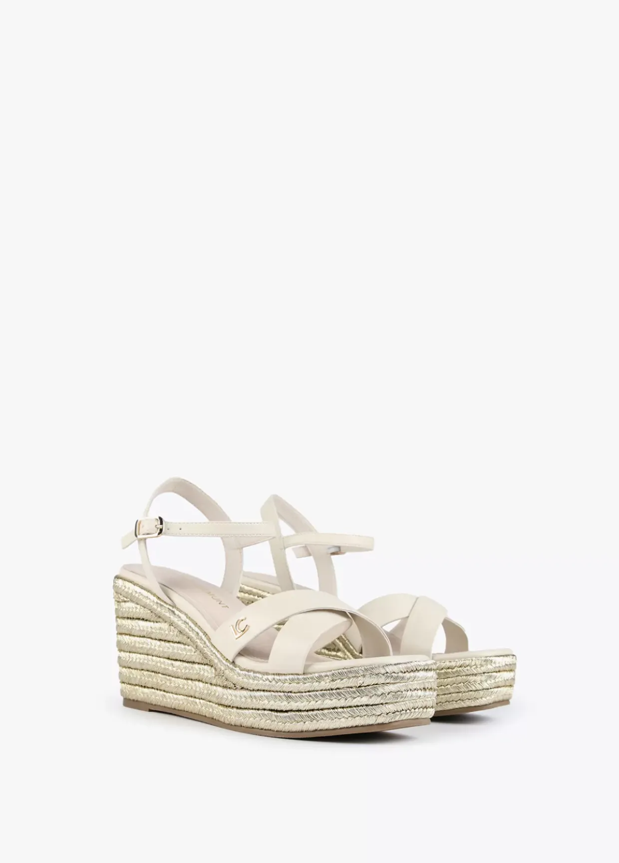 Sandalia tipo cuña metalizada