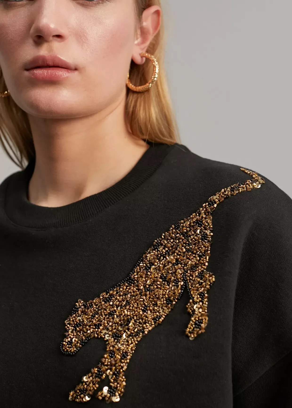 Sudadera detalle tigres