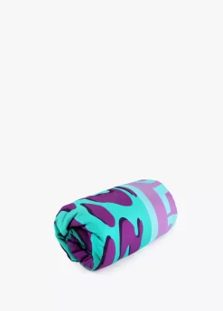 Toalla leopardo turquesa.