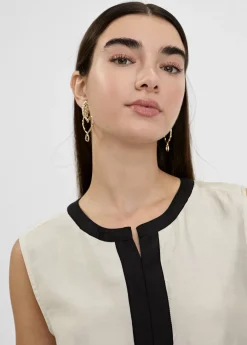 Top bicolor con aberturas