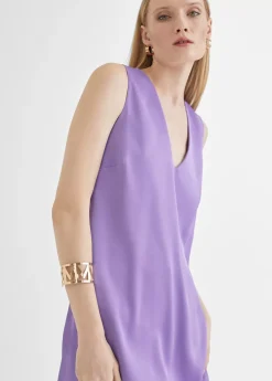 Top largo con aberturas