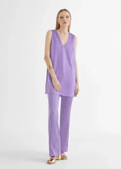 Top largo con aberturas