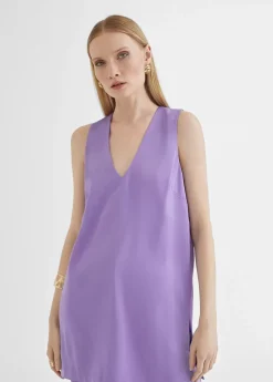 Top largo con aberturas